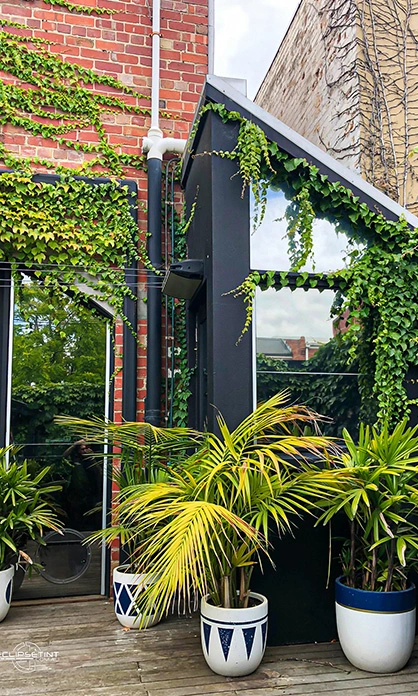 Privacy window film with mirrored exterior finish